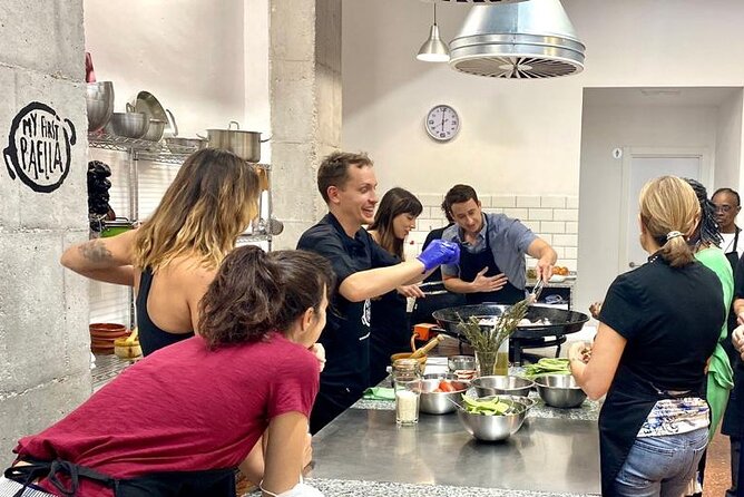 Valencian paella cooking class, tapas and visit to Ruzafa market. - Walking to the kitchen for sangria and tapas